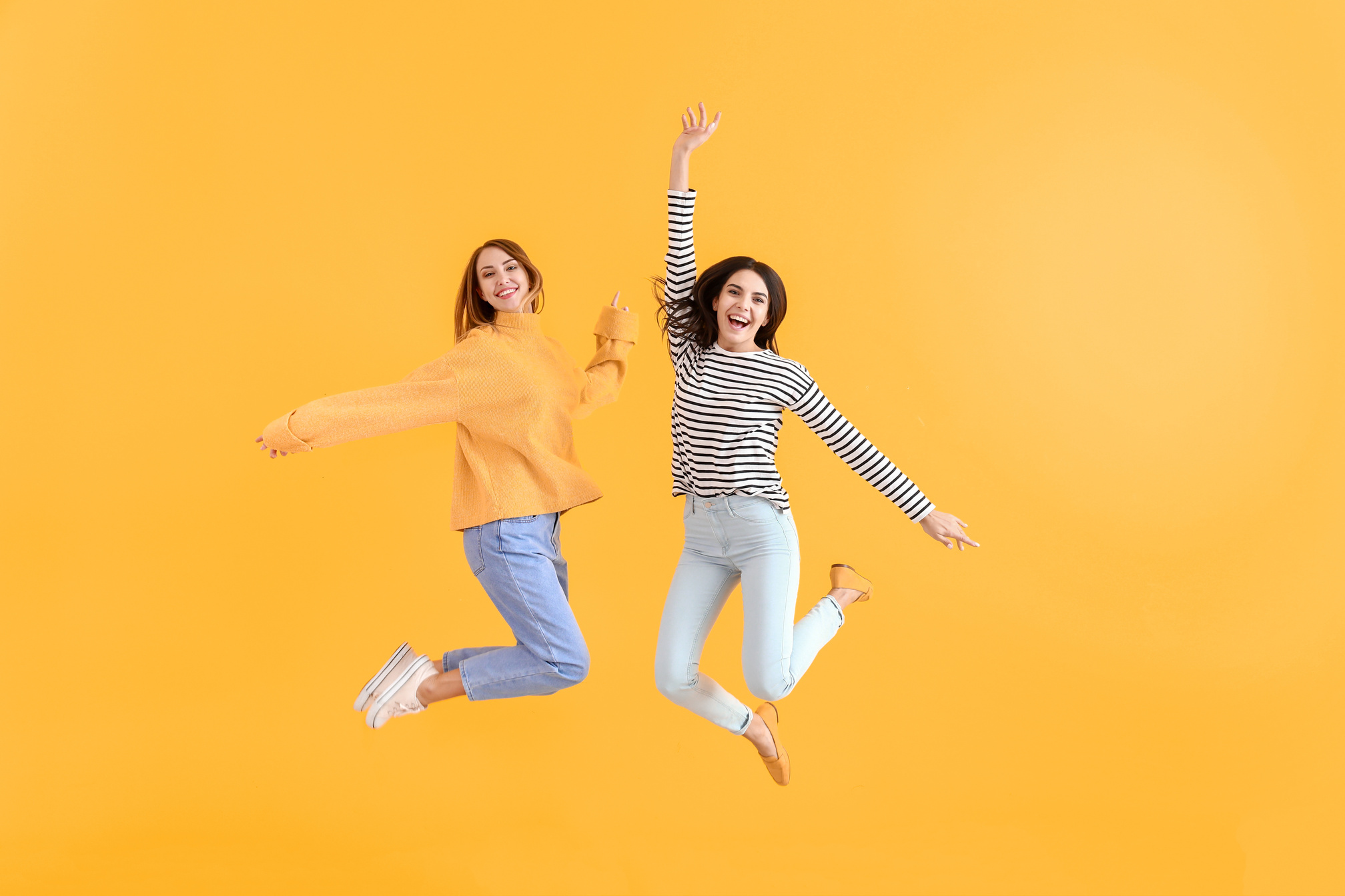 Jumping Women on Color Background